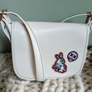 Coach Patricia Saddle 23 with Varsity Patches